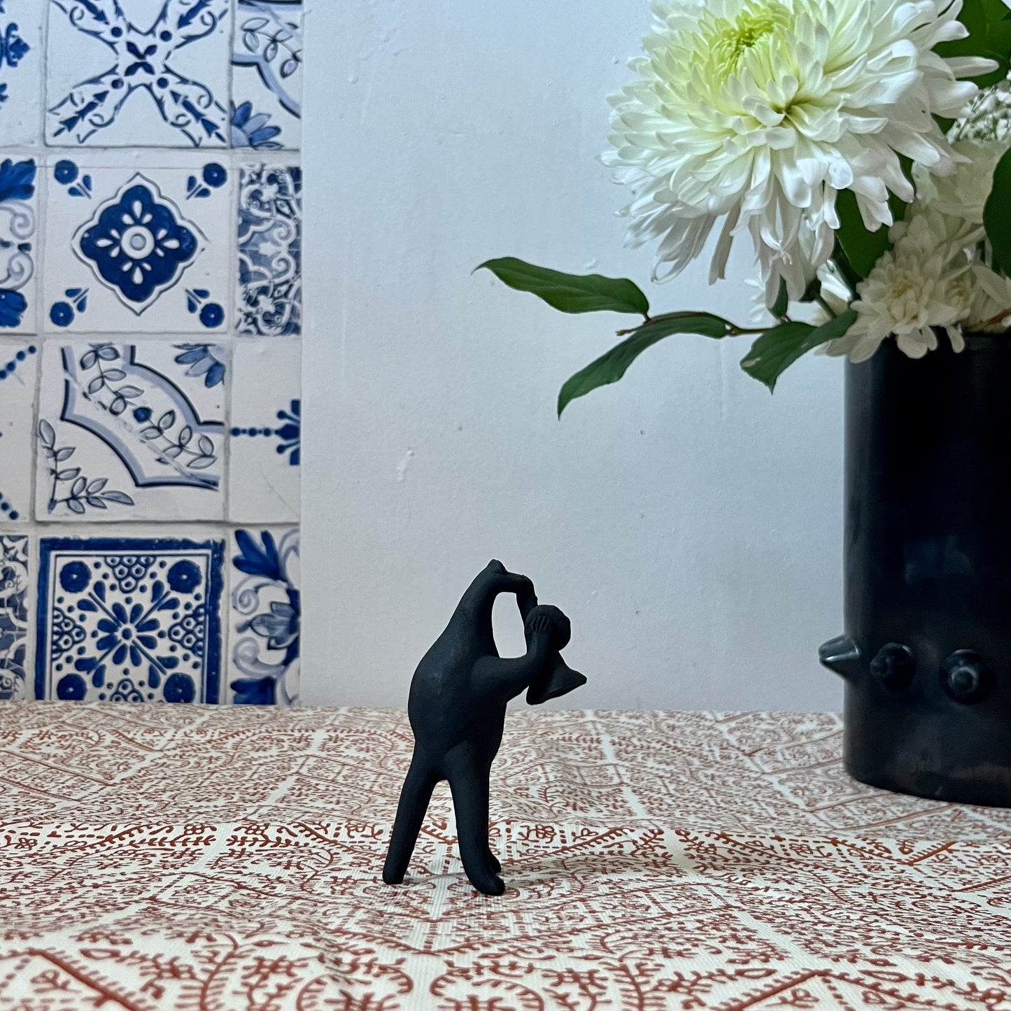 Taller Coatclicue Frog Playing Trumpet Figure